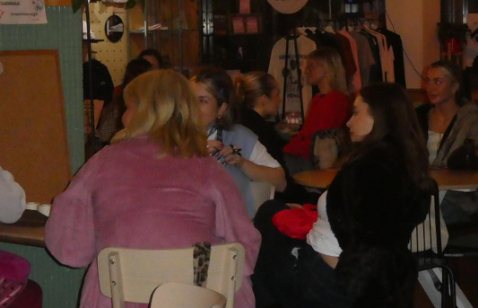 An image of a group chatting at a bar